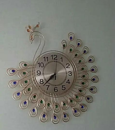 horloge paon